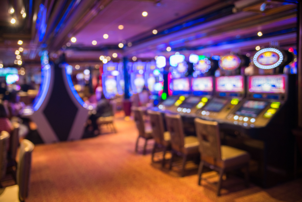 BlurredImageOfSlotsMachinesAtTheCruiseLinerPeople