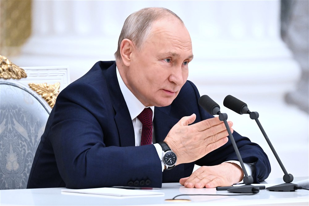 Russian President Vladimir Putin attends a meeting with graduates of the Russian Presidential Academy of National Economy and Public Administration in Moscow