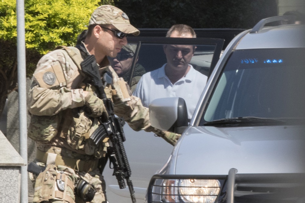 Brazilian police search homes of businessman and ex Attorney General