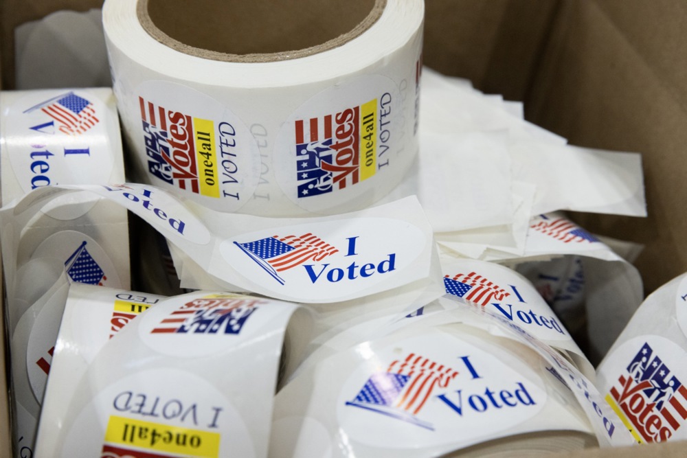 Preparation of a voting site on the eve of the New Hampshire primary