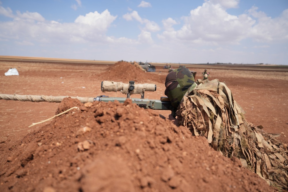 Turkish-backed Syrian rebel fighters carry out military training