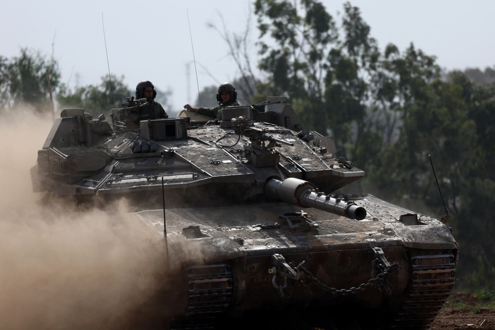 Israeli army gather near the border with Gaza