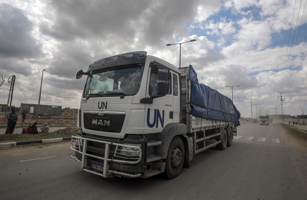 UN trucks bring humanitarian aid to the Gaza Strip