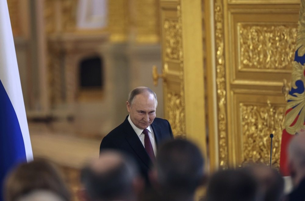 Russian President Vladimir Putin meets election agents at the Kremlin