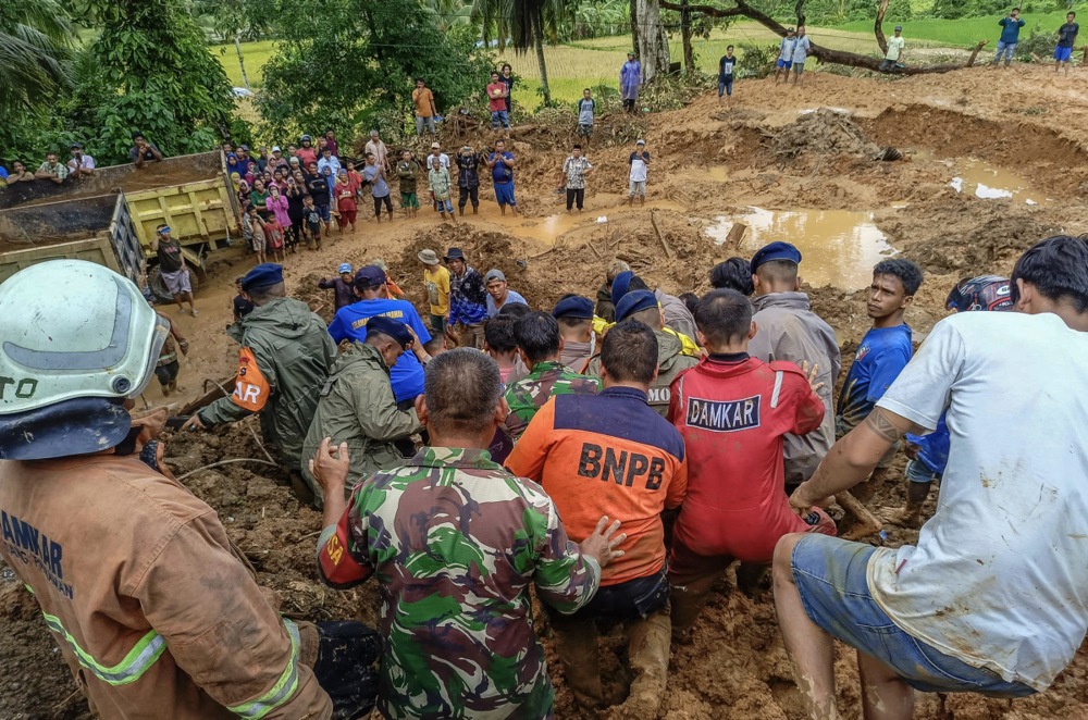 Floods and landslides kill at least 19 people in Indonesia's West Sumatra