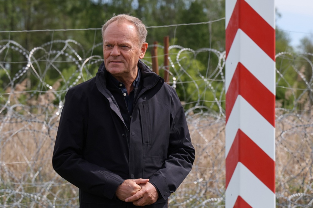 Polish Prime Minister Donald Tusk visits the border with Belarus