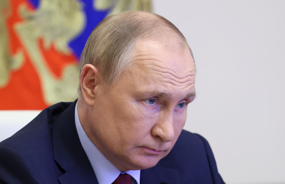 Russian President Vladimir Putin attends teleconference call