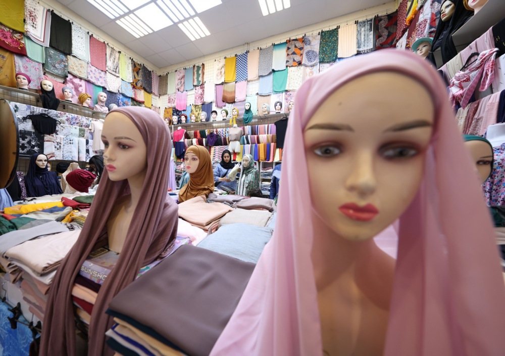 People break fast with Iftar meal at Global Village during Ramadan in Dubai