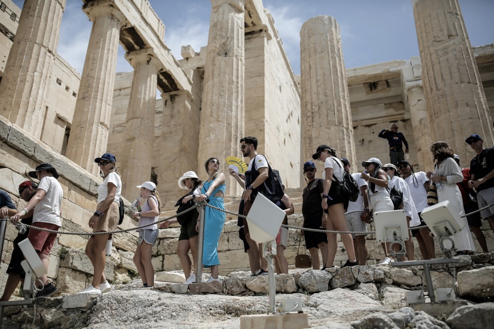 Tourists visit the Acropolis amid heatwave in Greece