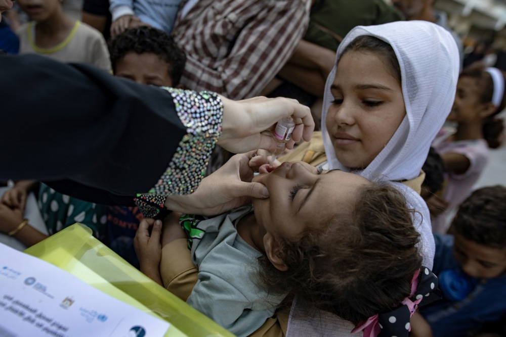 Palestinian children receive polio vaccine in Khan Yunis, southern Gaza