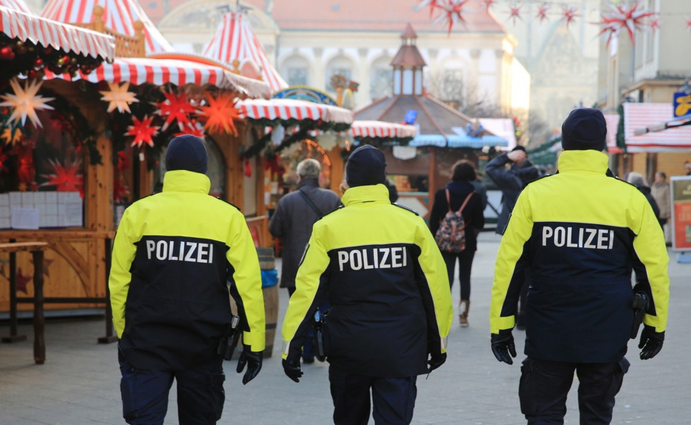 Police officers patrol the Magdeburg Christmas market
