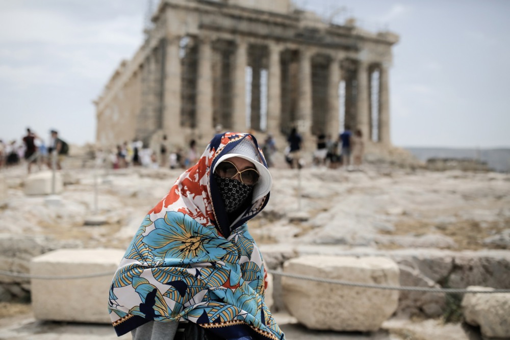 Tourists visit the Acropolis amid heatwave in Greece