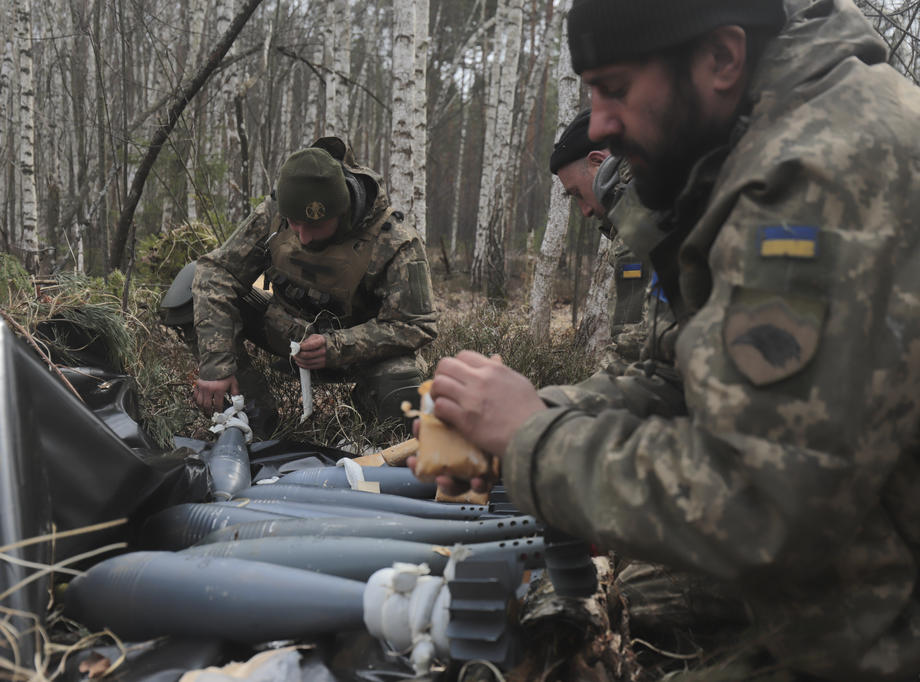 Ukrainian servicemen attend their positions not far from Kyiv