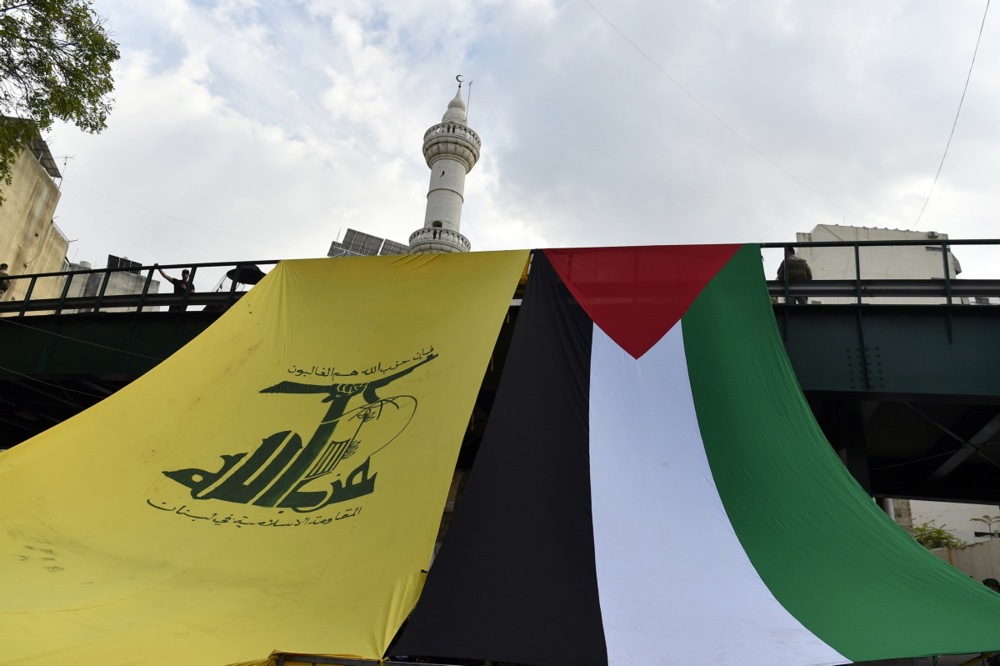 Hezbollah supporters demonstrate in solidarity with Palestinians