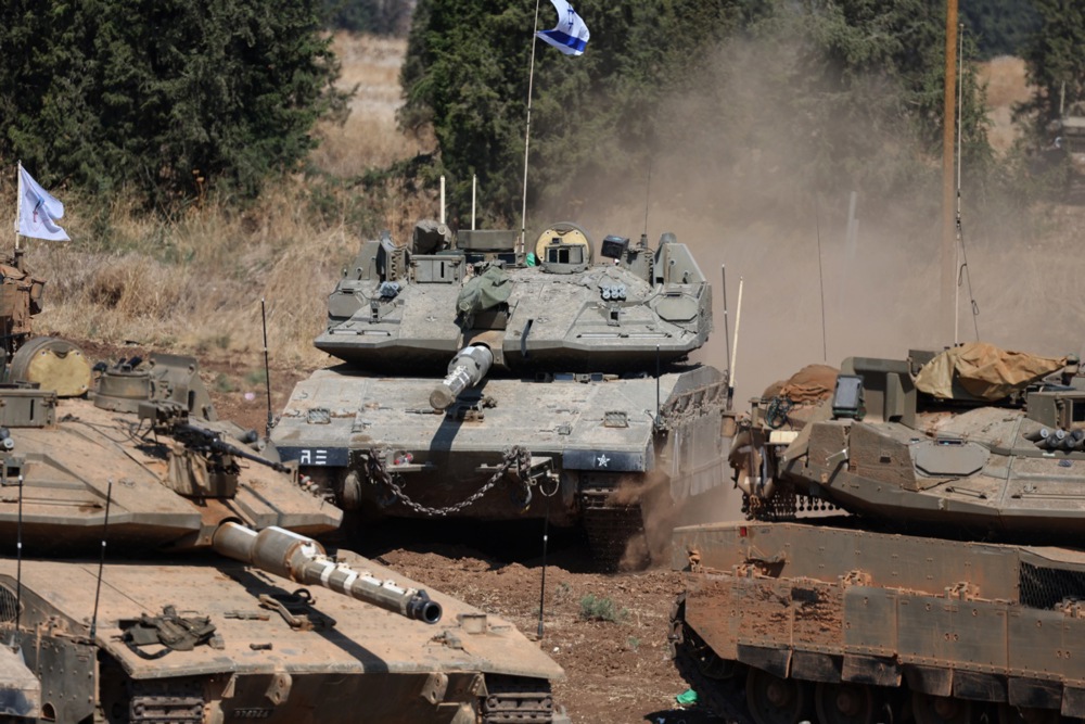 Israeli troops gather at southern Lebanon border