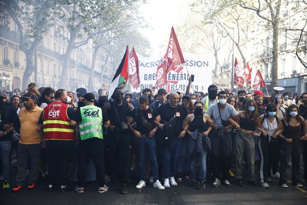 French unions stage protests in Paris against austerity budget cuts
