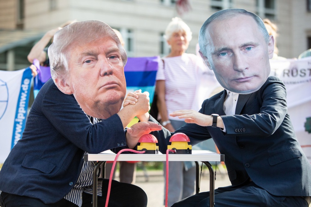 Activists protest the ending of the INF treaty