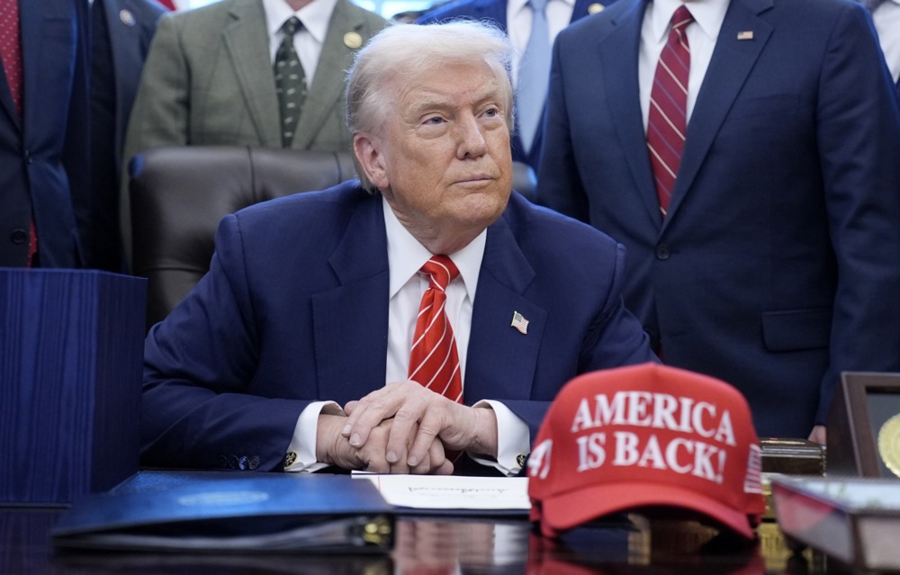 US President Trump signs funding bill to end brief shutdown