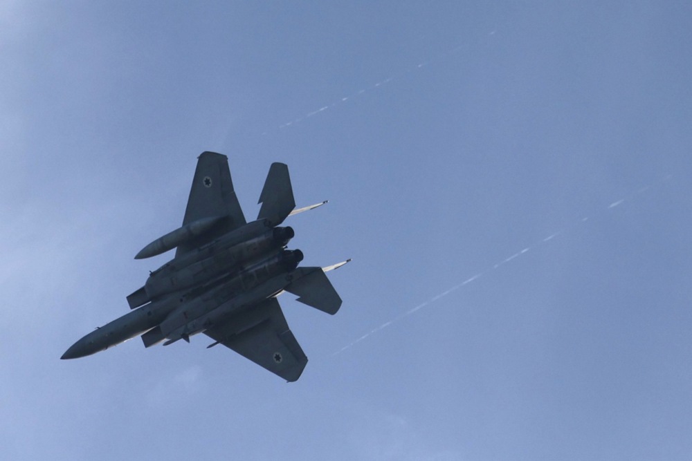 Israeli F-15 fighter jets fly over central Israel