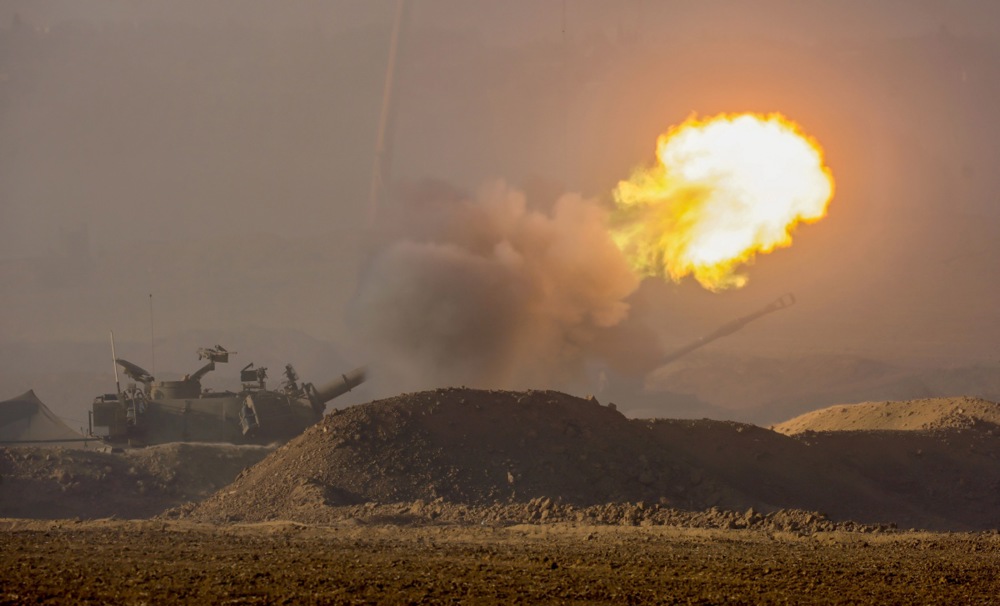 Israeli forces stationed along the border with Gaza