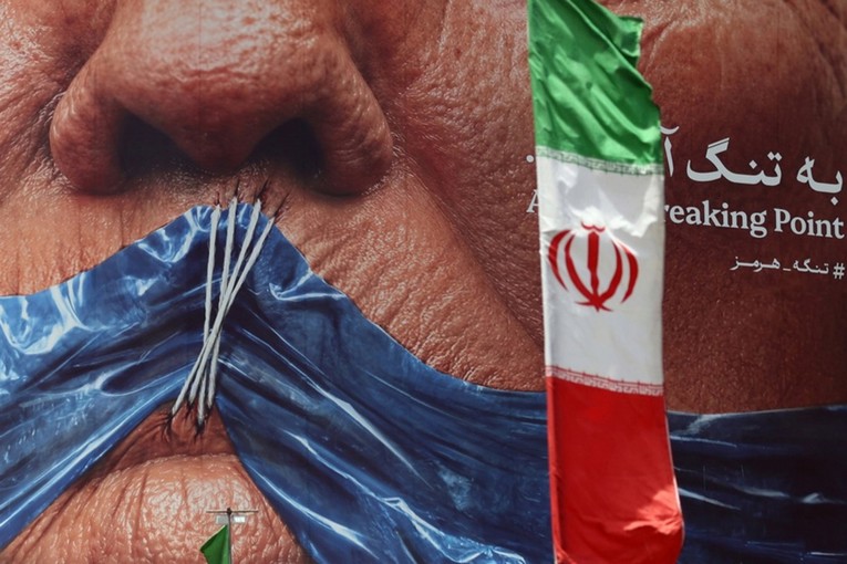 US pauses guiding ships through Hormuz amid talks with Tehran