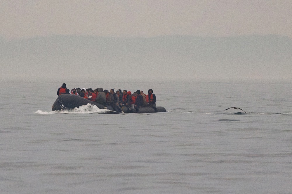 Migrants are rescued as they cross the English Channel by boat to the UK
